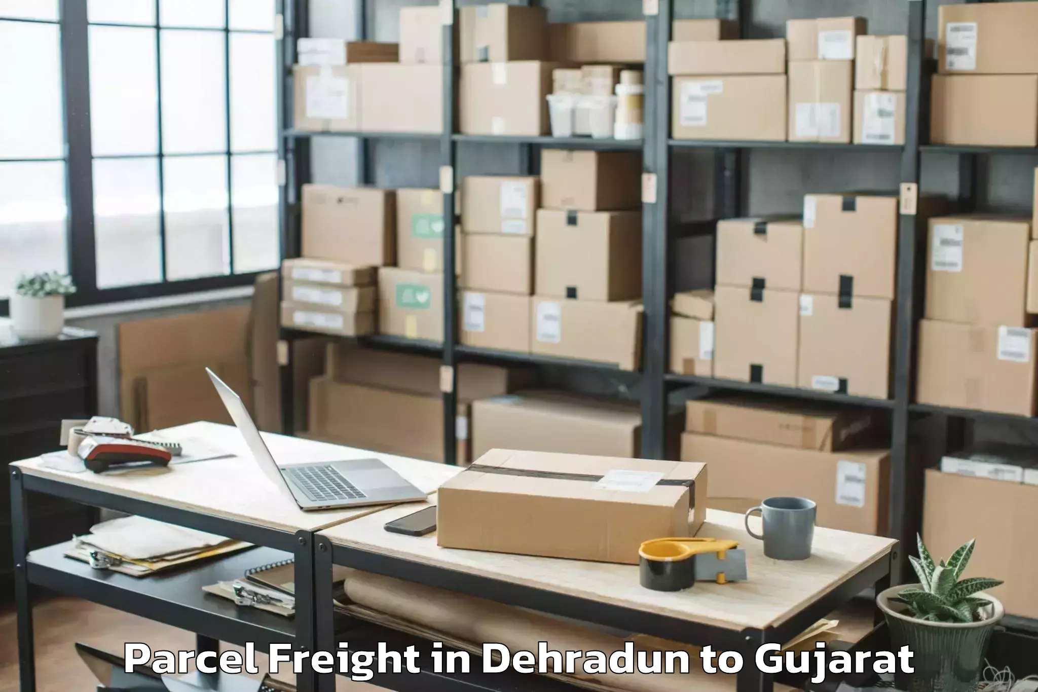 Expert Dehradun to Jhalod Parcel Freight